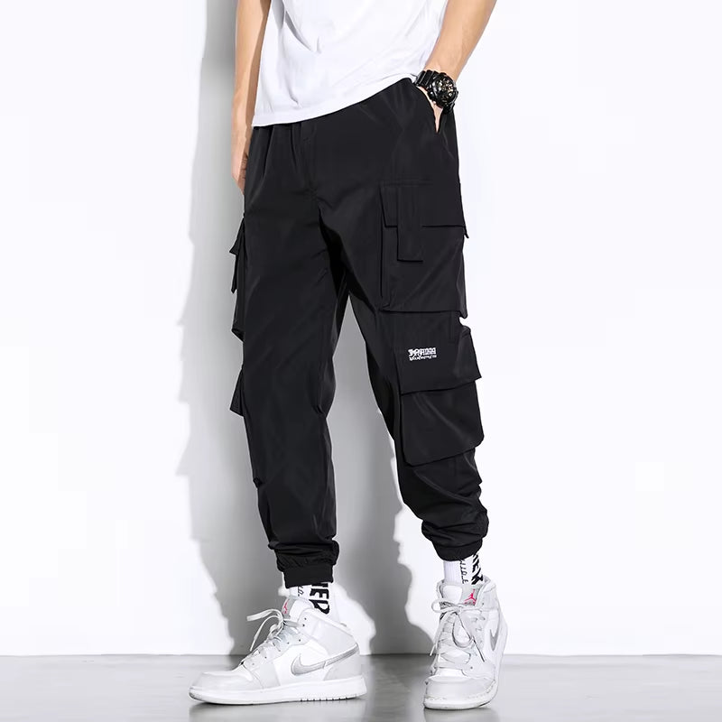 Streetwear Mens Hip Hop Jogging Pants Casual Men Trousers Big Size Loose Sweatpants Male 2023 New Multi Pocket Harem Pants 5XL